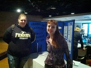 Two women at Family Resource Center booth at Ferrum College Fair
